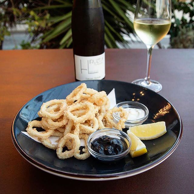 New at Vino&Co. Our version of super crispy calamares with a black alioli with squid ink and black garlic and classic tartare sauce. Great with an ice cold glass of Hiruzta Txakolina from Getariako Txakolina, Hondarribia, País Vasco!  Calamares €10  Glass of Txakoli €4,20